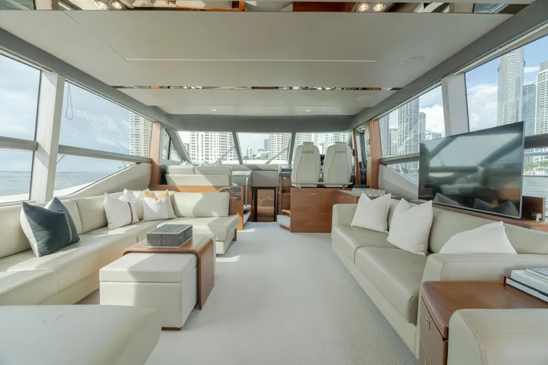 Slide: The Image of Luxurious interior of 2019 Princess F70 yacht with modern seating and panoramic windows. - 4