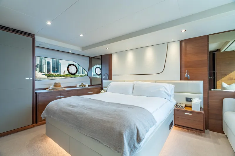 Slide: The Image of Luxurious bedroom interior on 2019 Princess F70 yacht with modern design and city view. - 6