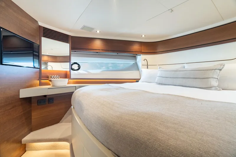 Slide: The Image of Luxurious bedroom interior of 2019 Princess F70 yacht with modern design and cozy bedding. - 9