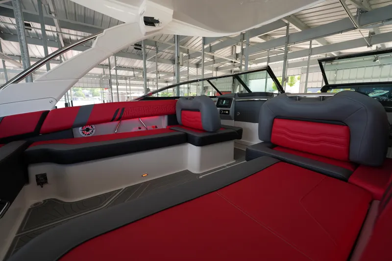 Slide: The Image of Luxurious interior of 2025 Regal LS9 boat with red and gray seating. - 17