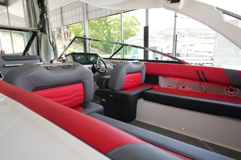 Slide: The Image of Interior of 2025 Regal LS9 boat with red and gray seating. - 27