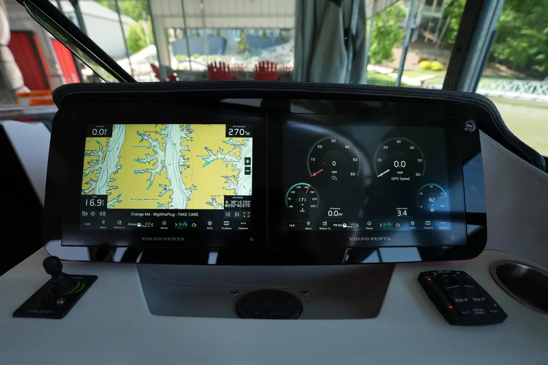 Slide: The Image of Dashboard of 2025 Regal LS9 boat with navigation and control screens. - 41