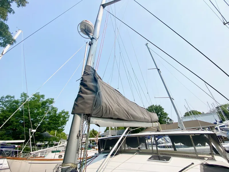 Slide: The Image of 2016 Celtic Yachts 40 sailboat with mast and rigging in a marina setting. - 22