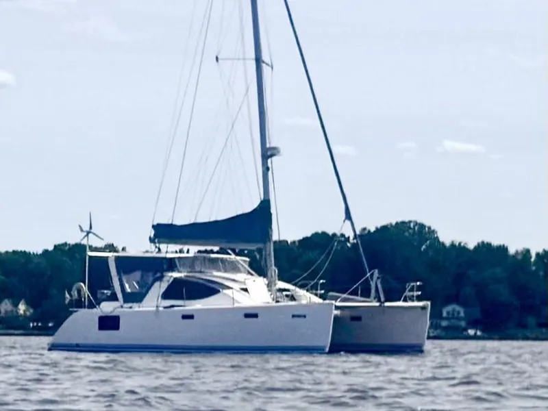 Slide: The Image of 2016 Celtic Yachts 40 catamaran sailing on calm waters. - 1