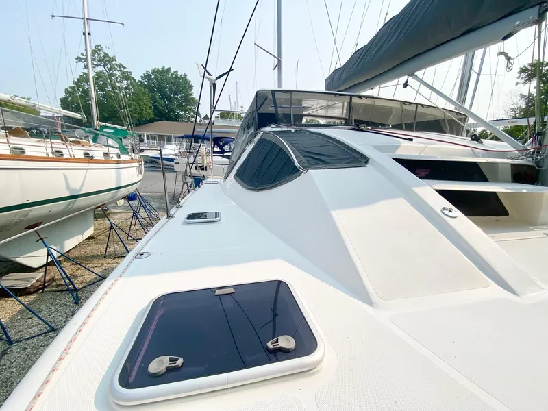 Slide: The Image of 2016 Celtic Yachts 40 sailboat on land, showcasing sleek deck design and modern features. - 25