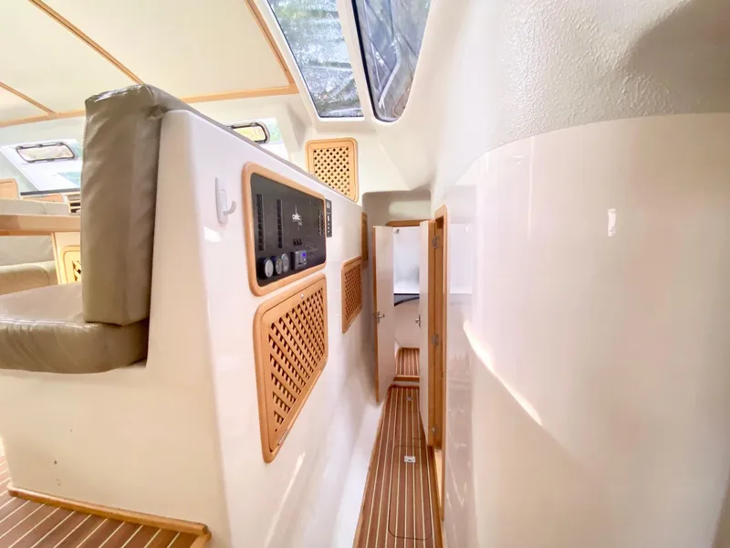Slide: The Image of Interior of 2016 Celtic Yachts 40, featuring sleek design and wooden accents. - 47