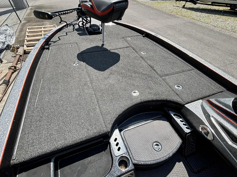 Slide: The Image of 2020 Caymas CX21 boat deck with seating and storage compartments. - 6