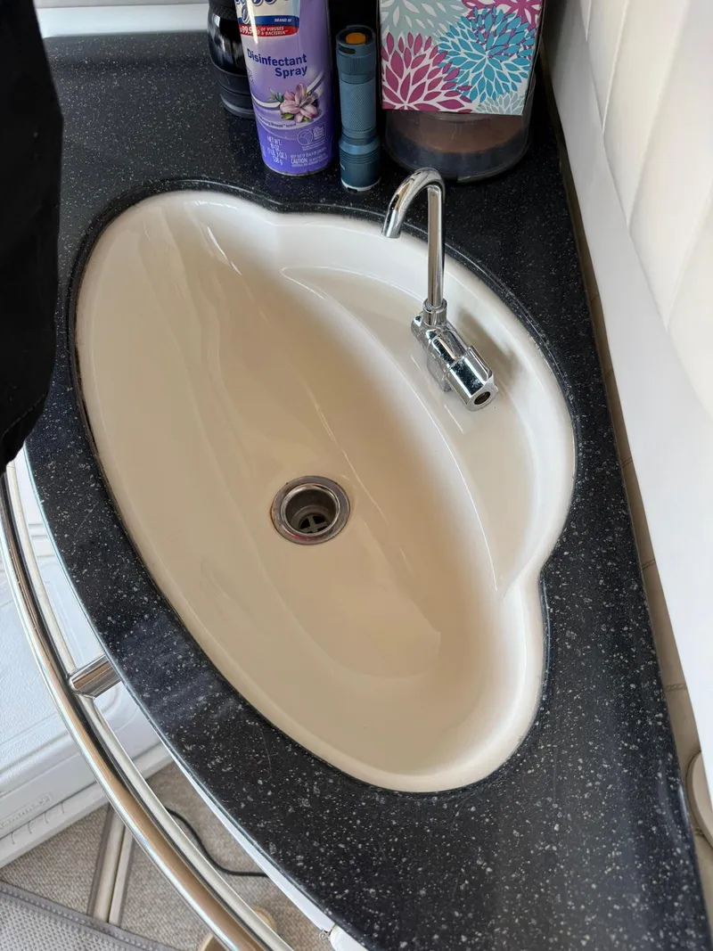 Slide: The Image of Oval sink with modern faucet on Maxum 3700 SCR yacht, 2000 model. - 10