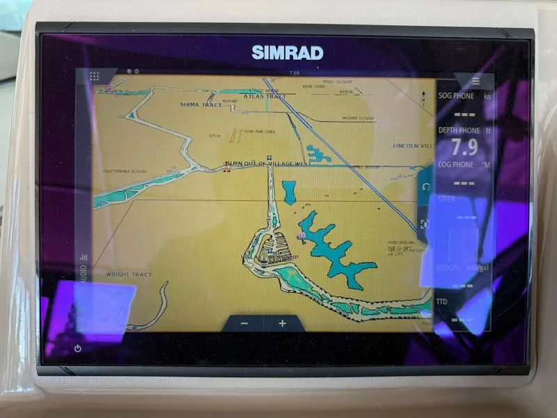 Slide: The Image of Simrad navigation display on 2000 Maxum 3700 SCR boat, showing detailed marine map. - 22
