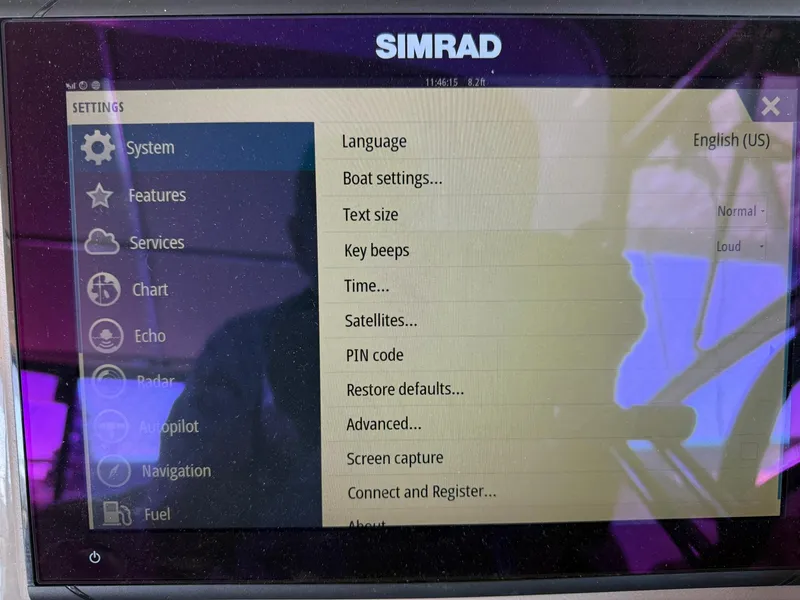 Slide: The Image of Simrad navigation system settings on Maxum 3700 SCR, 2000 model boat. - 23