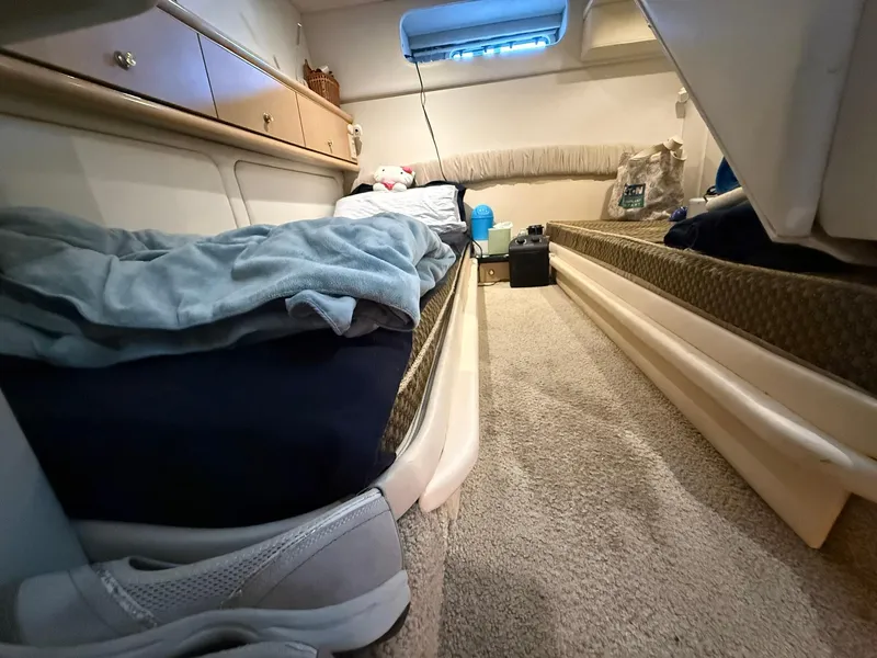 Slide: The Image of Interior cabin of 2000 Maxum 3700 SCR boat with cozy sleeping area. - 30