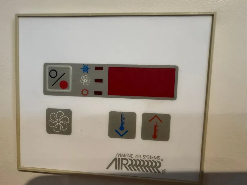 Slide: The Image of Control panel of Marine Air Systems on a 2000 Maxum 3700 SCR boat. - 32