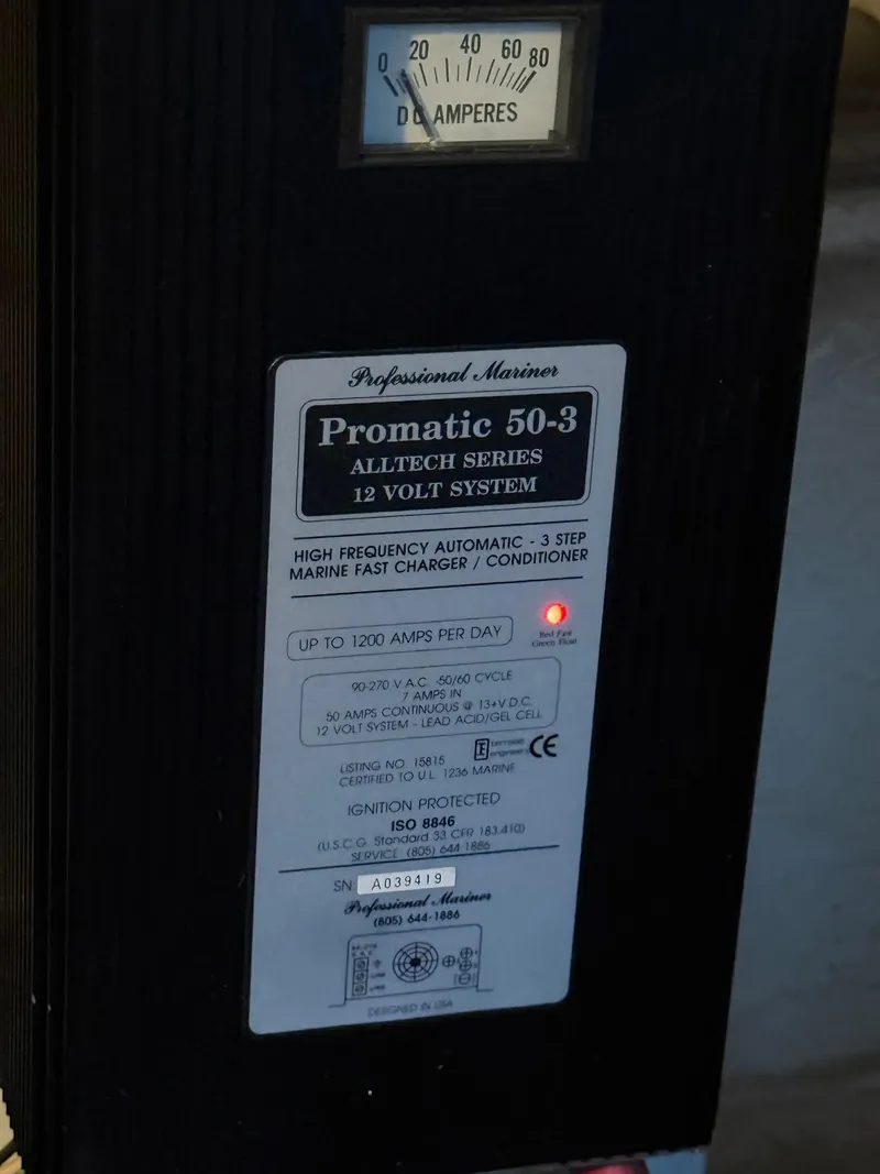 Slide: The Image of Promatic 50-3 marine charger, 12V system, high frequency, Maxum 3700 SCR 2000 model. - 46