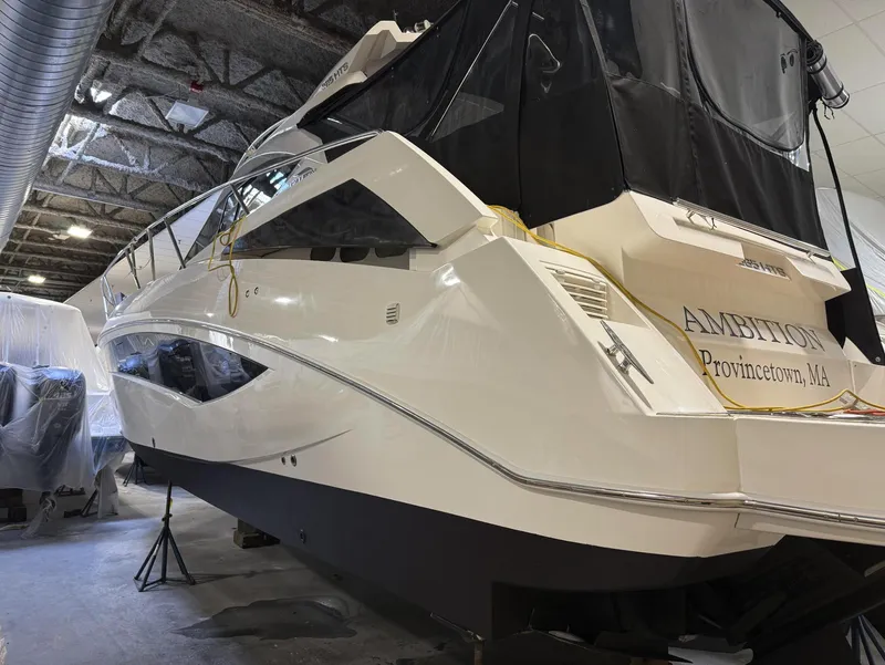 Slide: The Image of 2018 Galeon 385 HTS yacht in a storage facility, rear view. - 4