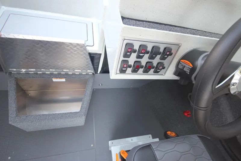 Slide: The Image of 2026 Weldcraft 220 Ocean King F250 dashboard with control panel and storage compartment. - 23