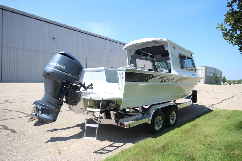 Slide: The Image of 2026 Weldcraft 220 Ocean King F250 boat with Yamaha engine on trailer, parked outdoors. - 5