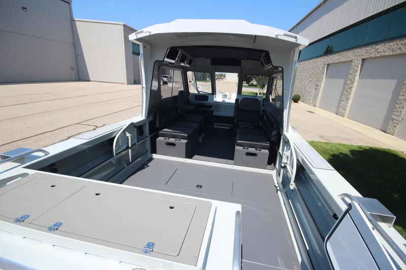Slide: The Image of 2026 Weldcraft 220 Ocean King F250 boat interior, spacious seating, modern design, in stock. - 8