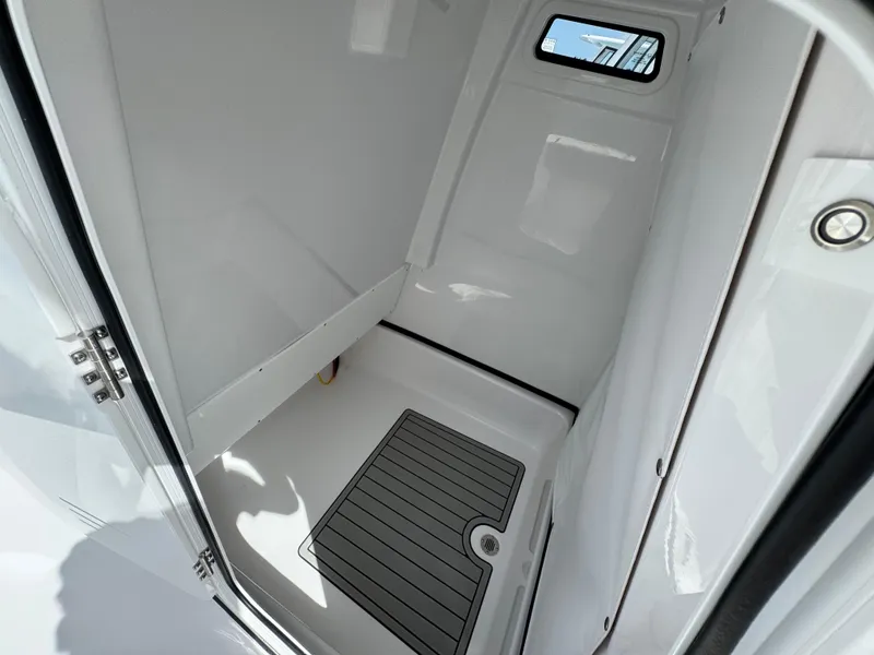 Slide: The Image of Interior of 2025 Sportsman Masters 247 Bay Boat, featuring a compact, modern design. - 16