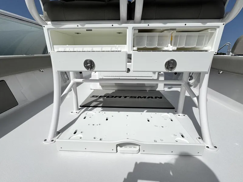 Slide: The Image of 2025 Sportsman Masters 247 Bay Boat interior with storage compartments and seating. - 30