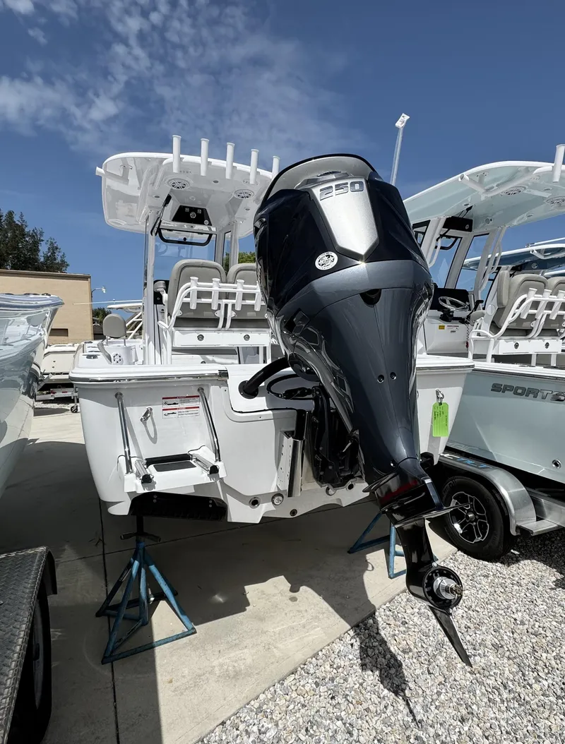 Slide: The Image of 2025 Sportsman Masters 247 Bay Boat with powerful outboard motor on display. - 4