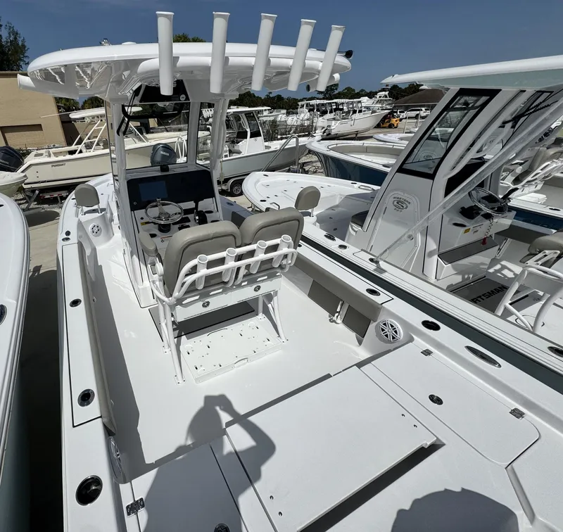 Slide: The Image of 2025 Sportsman Masters 247 Bay Boat with sleek design and modern features. - 7