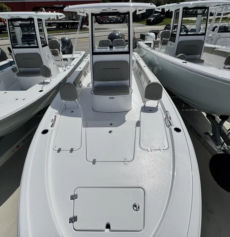 Slide: The Image of 2025 Sportsman Masters 247 Bay Boat, sleek design, spacious deck, modern features, ideal for fishing. - 9