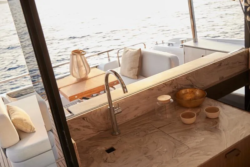 Slide: The Image of Luxurious Prestige F5.7 yacht interior with elegant marble countertop and ocean view, 2026 model. - 21