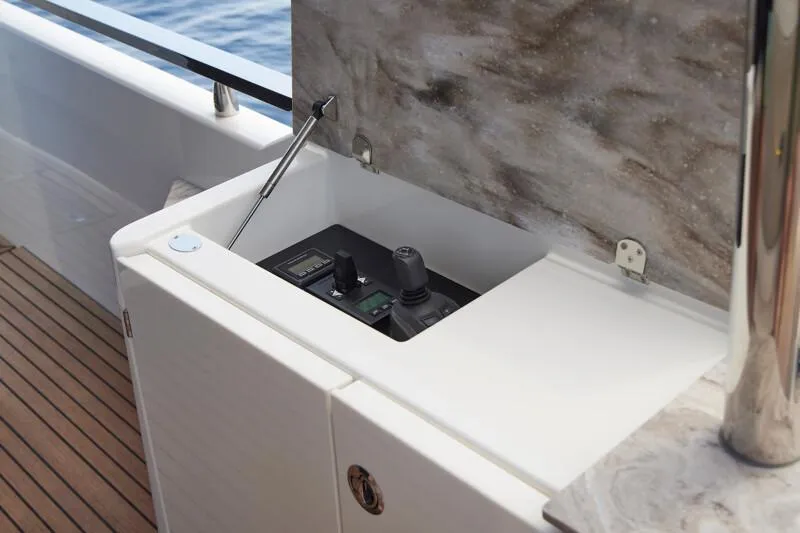 Slide: The Image of Control panel of 2026 Prestige F5.7 yacht, featuring sleek design and advanced technology. - 23