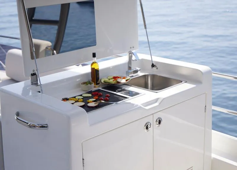 Slide: The Image of Outdoor yacht kitchen with grill and sink on Prestige F5.7, 2026 model. - 26