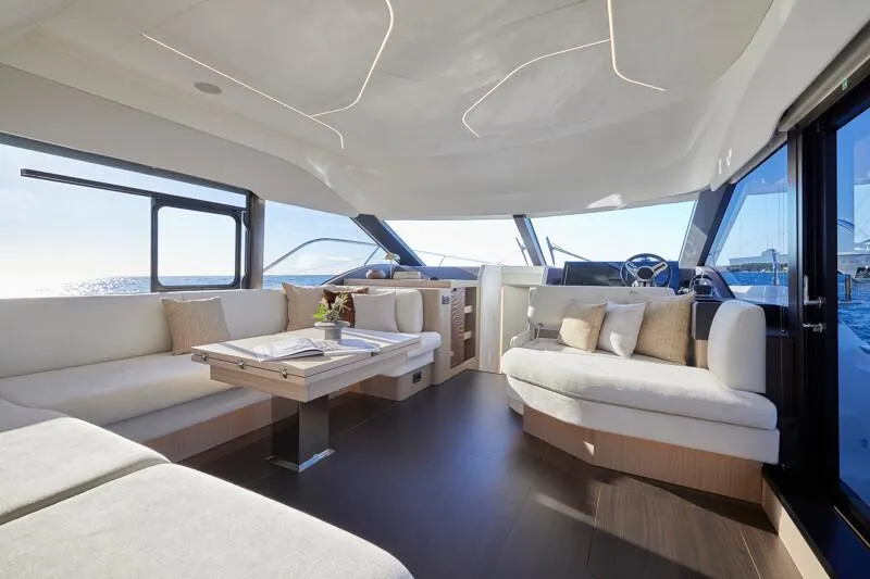 Slide: The Image of Luxurious interior of 2026 Prestige F5.7 yacht with elegant seating and panoramic views. - 31