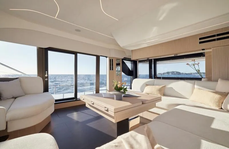 Slide: The Image of Luxurious interior of 2026 Prestige F5.7 yacht with ocean view and elegant furnishings. - 36
