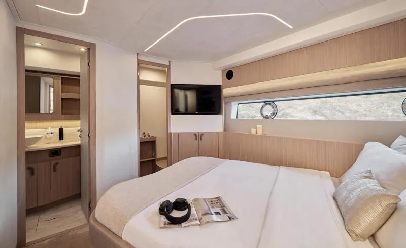 Slide: The Image of Luxurious bedroom interior of 2026 Prestige F5.7 yacht with modern design and amenities. - 41