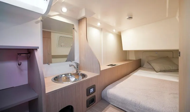 Slide: The Image of Luxurious cabin interior of 2026 Prestige F5.7 yacht with bed and sink. - 48