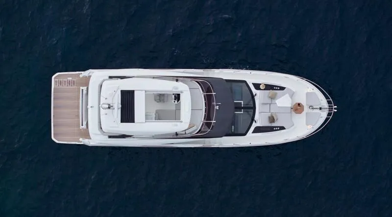 Slide: The Image of Top view of 2026 Prestige F5.7 yacht on open water. - 9