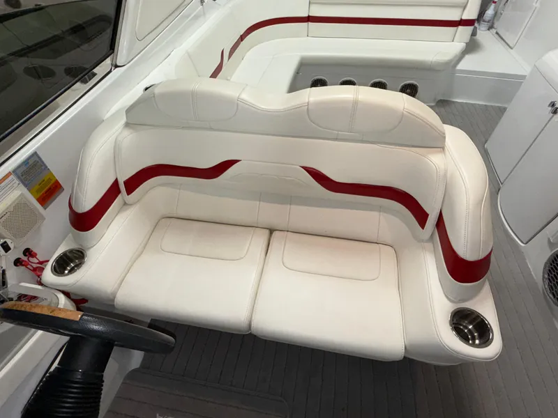 Slide: The Image of 2008 Formula 330 Sun Sport boat interior with white and red seating. - 11