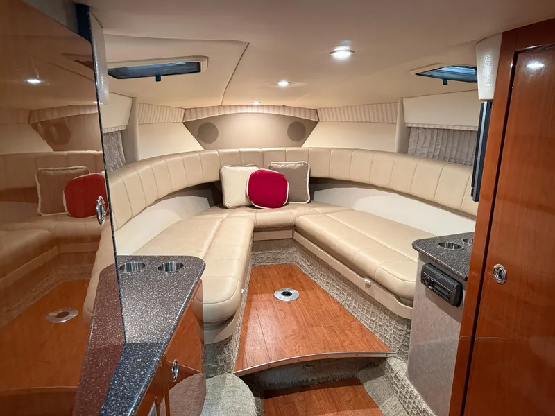 Slide: The Image of Luxurious interior of 2008 Formula 330 Sun Sport boat with plush seating and modern amenities. - 23