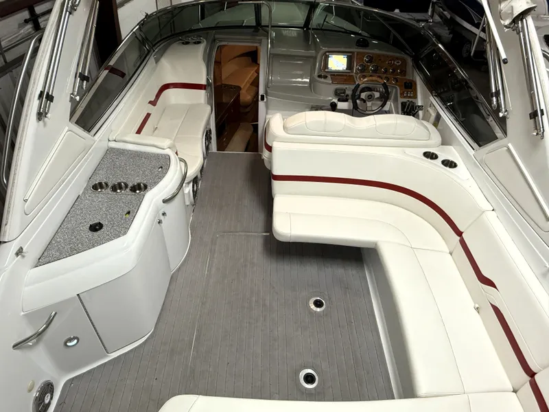 Slide: The Image of 2008 Formula 330 Sun Sport boat interior with white seating and modern dashboard. - 32