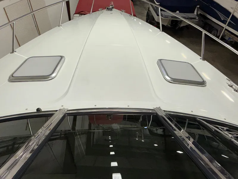 Slide: The Image of 2008 Formula 330 Sun Sport boat deck with hatches, viewed from the bow. - 6