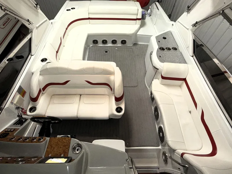 Slide: The Image of 2008 Formula 330 Sun Sport boat interior with white and red seating. - 9