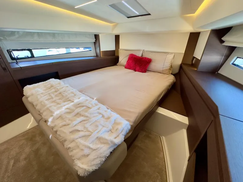 Slide: The Image of Luxurious bedroom interior of 2020 Prestige 460S yacht with cozy bedding and modern design. - 33