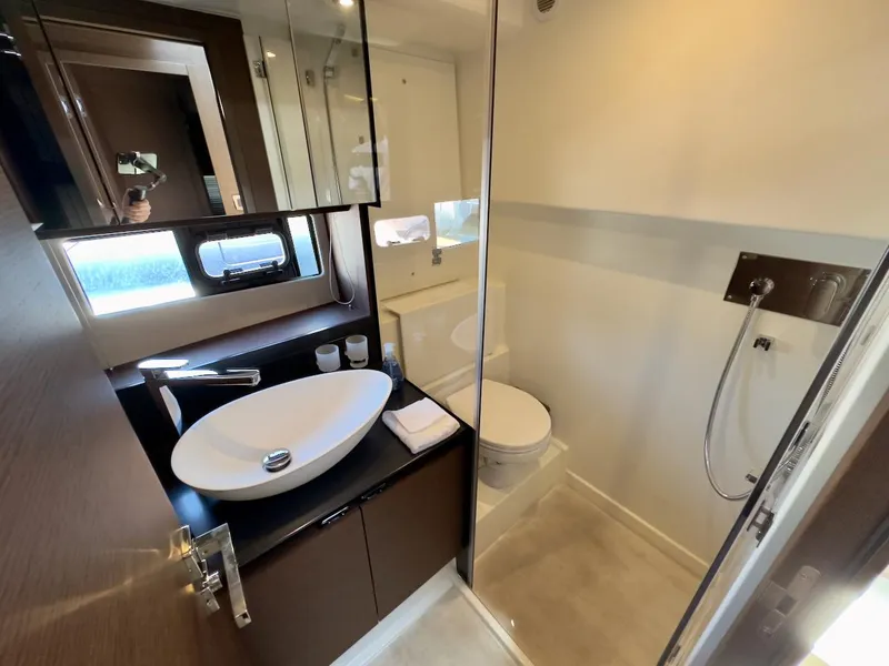 Slide: The Image of Luxurious bathroom in 2020 Prestige 460S yacht with modern fixtures and elegant design. - 34