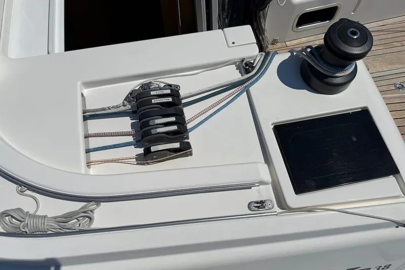 Slide: The Image of Deck of 2016 X-Yachts Xp38 sailboat with winch and rope clutches. - 16