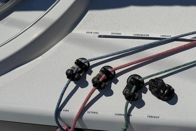 Slide: The Image of Deck rigging on 2016 X-Yachts Xp38 sailboat, featuring labeled control lines. - 17