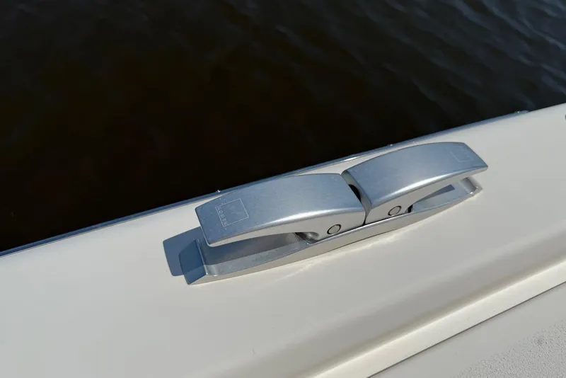 Slide: The Image of Sleek cleat on 2016 X-Yachts Xp38 sailboat, docked on calm water. - 21