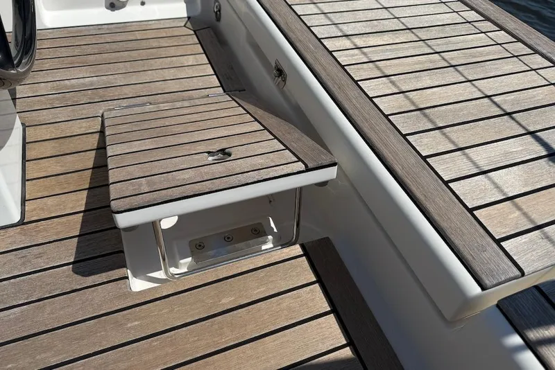Slide: The Image of Teak deck detail of 2016 X-Yachts Xp38 sailboat, showcasing elegant wood finish. - 22