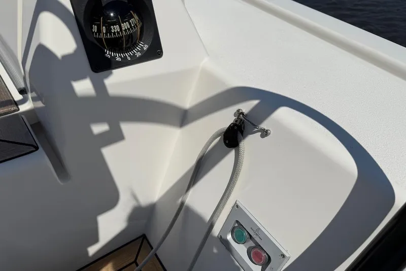 Slide: The Image of Cockpit detail of 2016 X-Yachts Xp38 sailboat with compass and control buttons. - 23