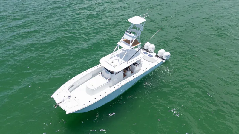 Slide: The Image of Aerial view of 2022 Freeman 43 boat cruising on open water. - 4