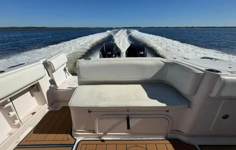 Slide: The Image of 2003 Grady-White Marlin 300 boat cruising on open water, view from the deck. - 20