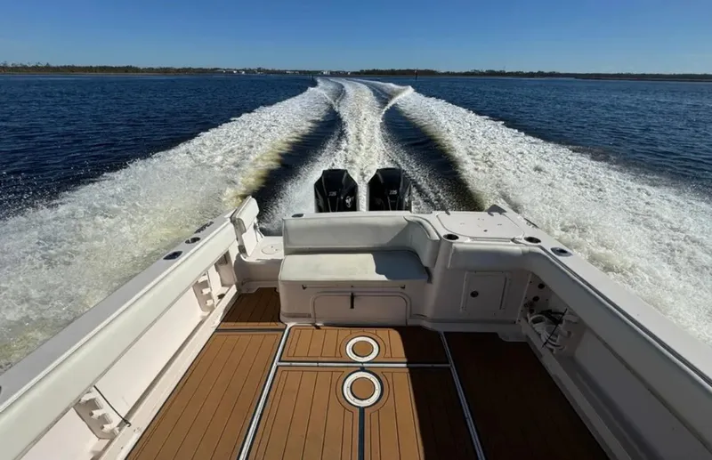 Slide: The Image of 2003 Grady-White Marlin 300 boat cruising on open water, view from the deck. - 27