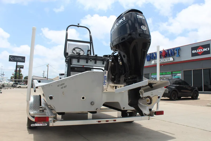 Slide: The Image of 2026 Freedom Boats EAGLE seat with blue and gray cushioned design. - 7